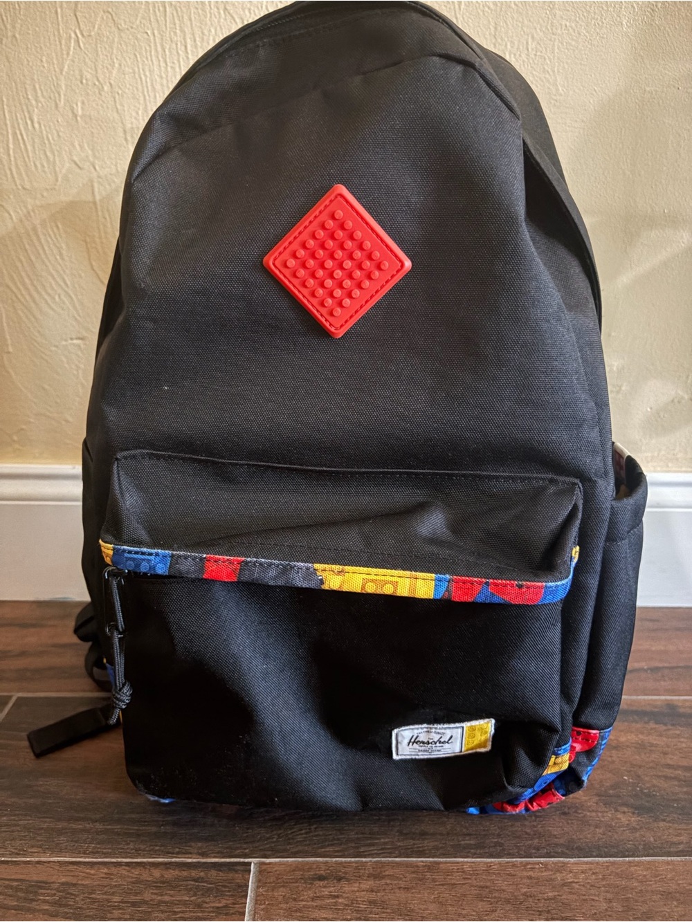 Herschel Supply Company LEGO Black Backpack with Red Badge and Multicolor Trim